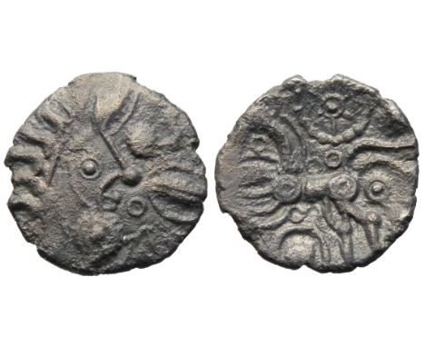 East Wiltshire Snake Head silver unit. Circa 50-35 BC. Moon head right, large boss chin, stalk lips, coffee bean motifs in fr