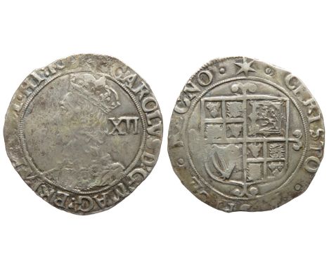 Charles I Shilling, 1625-49 AD. Tower mint, London. Crowned bust left, XII mark of value behind. R. Square-topped shield of a