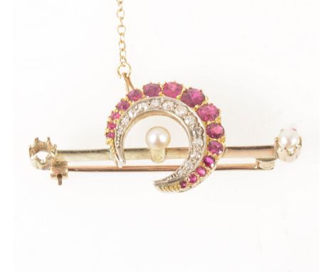 A 19th century ruby and diamond brooch, fifteen oval mixed cut rubies graduating in size with an inner border of thirteen old