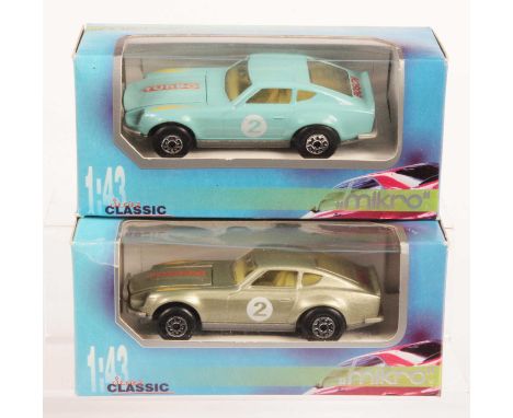 Matchbox Super Kings 2 x K-52 Datsun 240Z Made in Bulgaria Issues - both are clear windows, pale yellow interior, silver pain