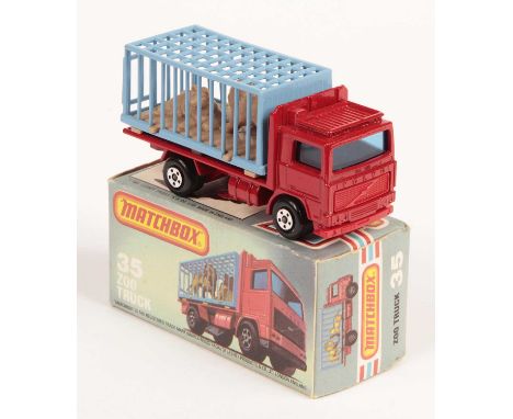 Matchbox Superfast 35c Volvo Zoo Truck - red body, blue windows, RED PLASTIC GRILLE &amp; BASE, light blue plastic cage WITH 