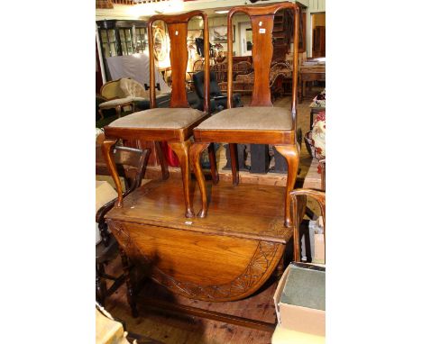 Carved oak barley twist gate leg dining table and pair cabriole leg dining chairs