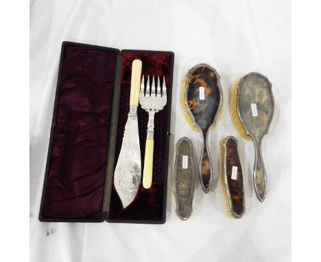 Late Victorian silver-mounted and faded tortoiseshell dressing table set of four pieces viz:- hand mirror, pair hair brushes 