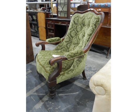 Victorian mahogany framed open arm easy chair with button upholstered back, padded arms and on turned supports 