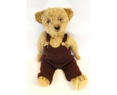 Old mohair teddy bear with glass eyes, sewn mouth and nose, jointed limbs, 50cm long 