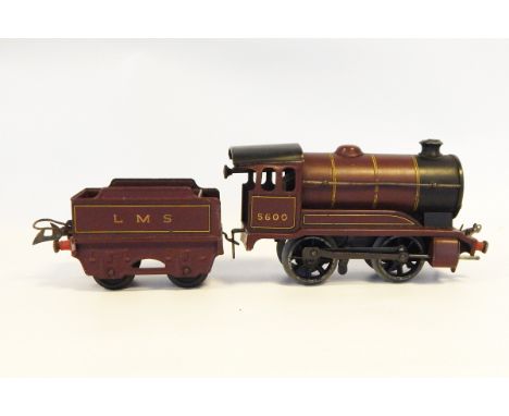 Hornby '0' gauge tinplate 0-4-0 tank engine No.5600 and tender in LMS Livery, six items of rolling stock including Hornby SO 