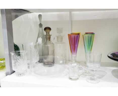 Collection of glassware engraved by D Moira Wyatt to include a graduated pair of vases with etched decoration, baluster-shape