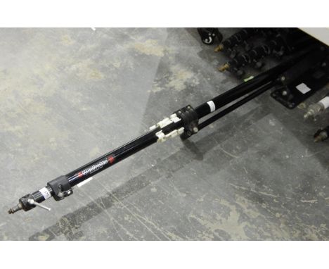 Two Manfrotto wall booms, three Manfrotto portable lighting tripod stands and two Manfrotto studio lighting stands with casto
