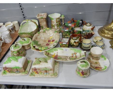 Quantity of Falconware including dishes, butter dishes, jam pots, small teapot, jug, flower holder, a Ye Olde Inne part tea s