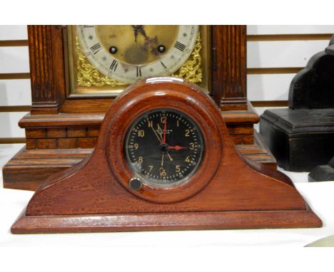 Waltham eight-day clock with black dial and illuminous numerals, sweep seconds hand, red time lapse indicator hands (possibly
