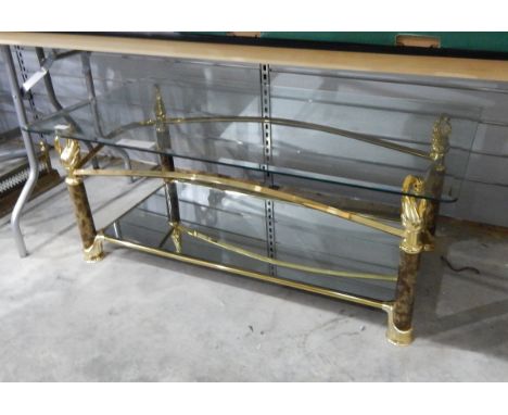 Glass topped coffee table with faux marble supports and brass-coloured metal, with a lower glass shelf, 117cm wide 