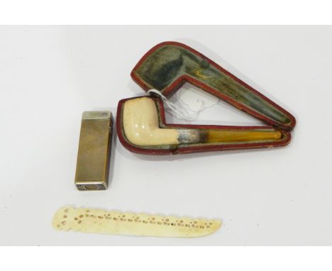 Meerschaum pipe with silver collar, a letter opener, a Dunhill lighter, a small pair of binoculars and a relief plaque of Nap