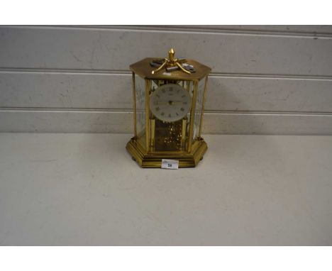 Kundo mantel clock in glazed brass mounted case