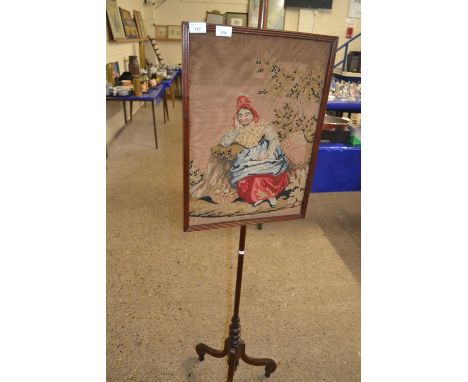 Tapestry fire screen set on a turned column with tripod base