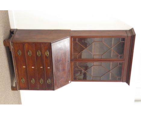 Early 19th century mahogany bureau bookcase, four graduating drawers, fall front revealing fitted interior, Corinthian and sh