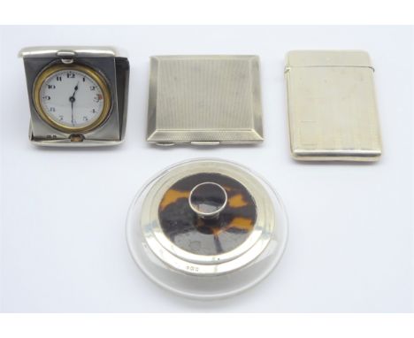 Engraved silver visiting card case Birmingham 1925, bedside watch in a silver case, engine turned silver compact and a glass 