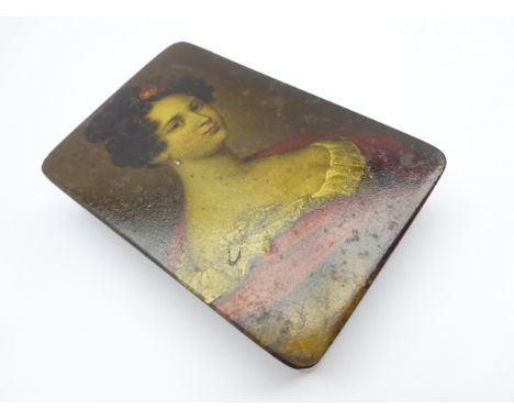 Early 19th century papier-mache snuff box by Stobwasser, of rectangular form painted with a portrait of a young woman titled 