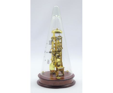 20th century brass skeleton clock striking bell on the hour, circular mahogany and walnut plinth, under glass cone with Roman