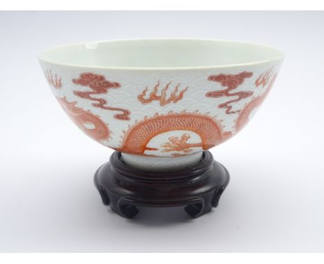 Chinese Shanghai Tang porcelain bowl decorated with a five-claw dragon chasing the flaming pearl, on stand, D14cm Condition R