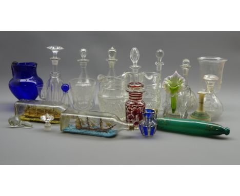 19th century Bristol blue jug, 19th century and later decanters, celery vase, glass rolling pin, 19th century jar and cover w