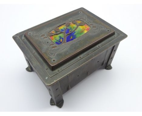 Art Nouveau copper and brass jewellery casket with enamel inset lid with all over relief floral stylized decoration, L13cm x 