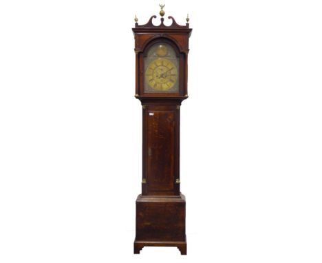 Late 18th century oak longcase clock, hood enclosed by stepped arch glazed door with two turned column supports, inlaid trunk