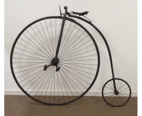 Victorian penny-farthing or high wheeler ordinary bicycle, iron framed black painted with gold lining, handles bars with turn