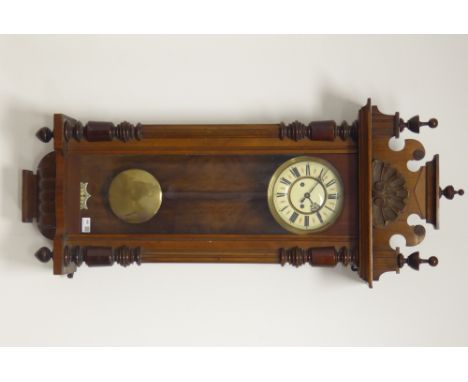 Early 20th century walnut cased Vienna style wall clock, twin spring train driven movement striking the hours and half on coi