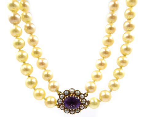 Double strand pearl necklace with amethyst and seed pearl gold clasp, hallmarked 9ct Condition Report & Further Details Pearl