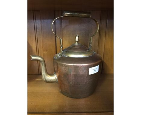 A vintage copper & brass kettle 