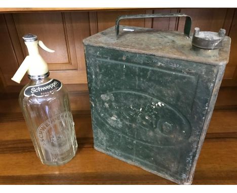 Vintage Schweppes soda water bottle together with Esso can fitted with Pratts lid. 