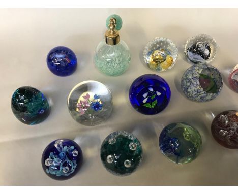 A Collection of 13 Caithness Scottish paperweights and Caithness perfume atomiser. Paperweights named blue pink posy Whitefri