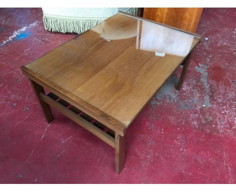 A retro 1960's glass top coffee table with slat lower level 