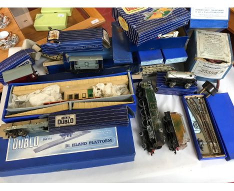 A box full of Hornby Dublo track, crossing,wagons, esso tanker, Platform & power packs mostly boxed 