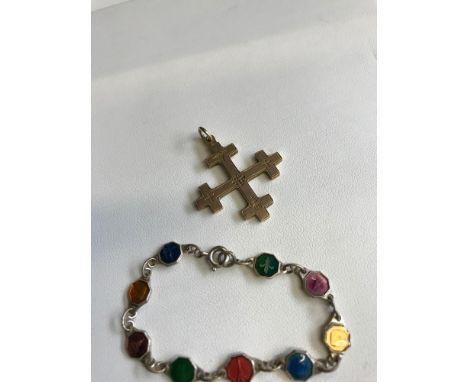 Jerusalem cross pendant possibly gold weighs 5.34grams, together with silver and enamel souvenir bracelet. 
