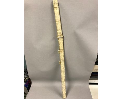 Japanese sword with carved bone handle and scabbard. Early 20th century. Samurai warriors carved down the scabbard and handle