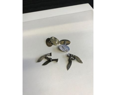 2 Pairs of silver cuff links which includes kukri knife set. 