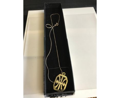 Edinburgh silver pendant by John Neil van Bogerijen. Comes with silver chain. 