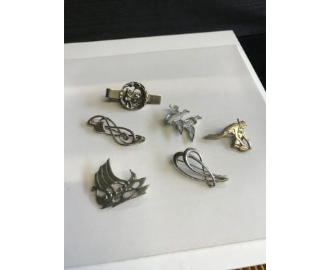 A lot of 6 various silver and white metal brooches which includes 3 Ortak silver brooches 