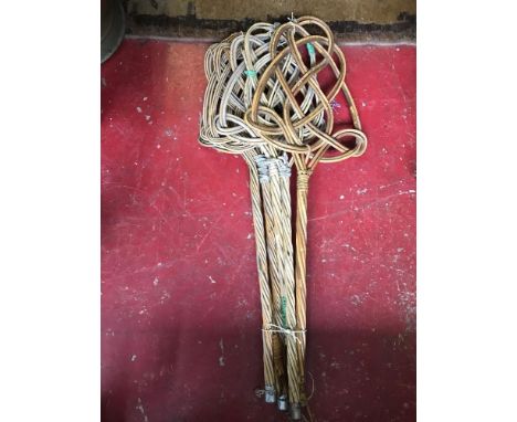 A Collection of vintage rug beaters 