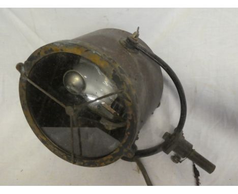 An old brass mounted copper nautical-style search lamp, 12" diameter on iron mounting bracket