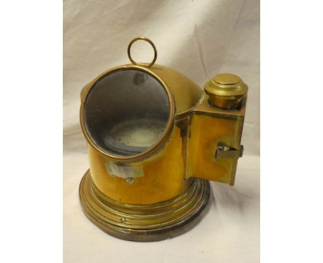 A painted metal ship's binnacle compass with liquid circular gimbled dial in brass domed case 10½" high 