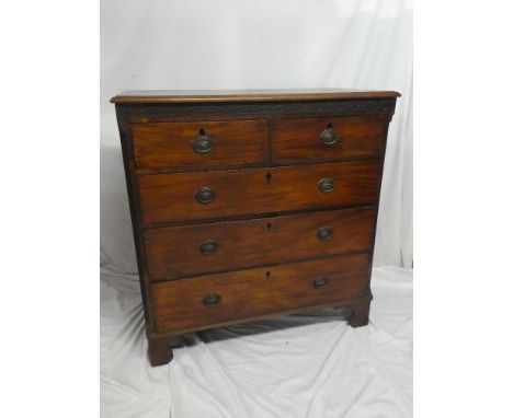 A 19th Century mahogany chest of two short and three long drawers with ring handles on bracket feet