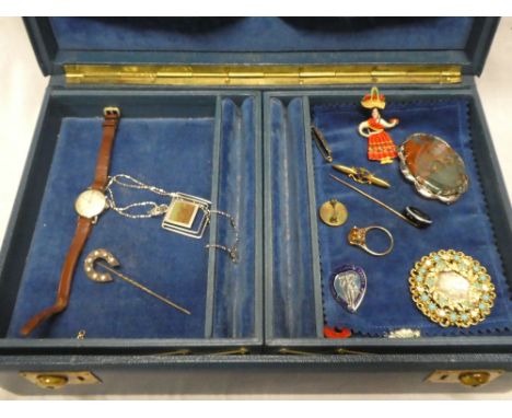 A jewellery box containing a small selection of various jewellery including 9ct gold dress ring, silver oval brooch with moth