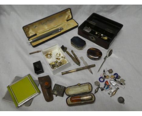 A jewellery box containing a selection of various costume jewellery, cheroot holder, miniature lacquered snuff box, silver sp