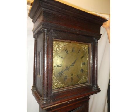 An 18th Century longcase clock with 11" brass square dial by Thomas Dawes of Northampton, 30-hour movement in oak traditional