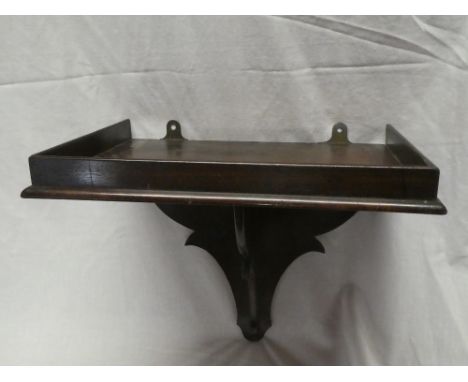 An old polished mahogany rectangular wall bracket 13½" wide