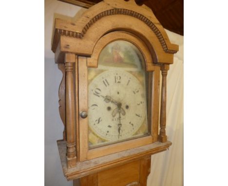 A 19th Century longcase clock by R.T. Daniel (probably of Marazion) with 12" painted arched dial and 8-day movement in polish