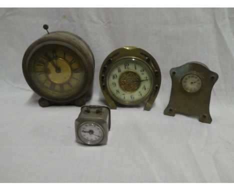 A small mantel clock with circular dial in brass horseshoe-shaped case, small German circular mantel clock in polished walnut
