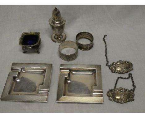 A pair of silver square ashtrays with engine turned decoration, Birmingham marks; small silver baluster pepperette; two silve